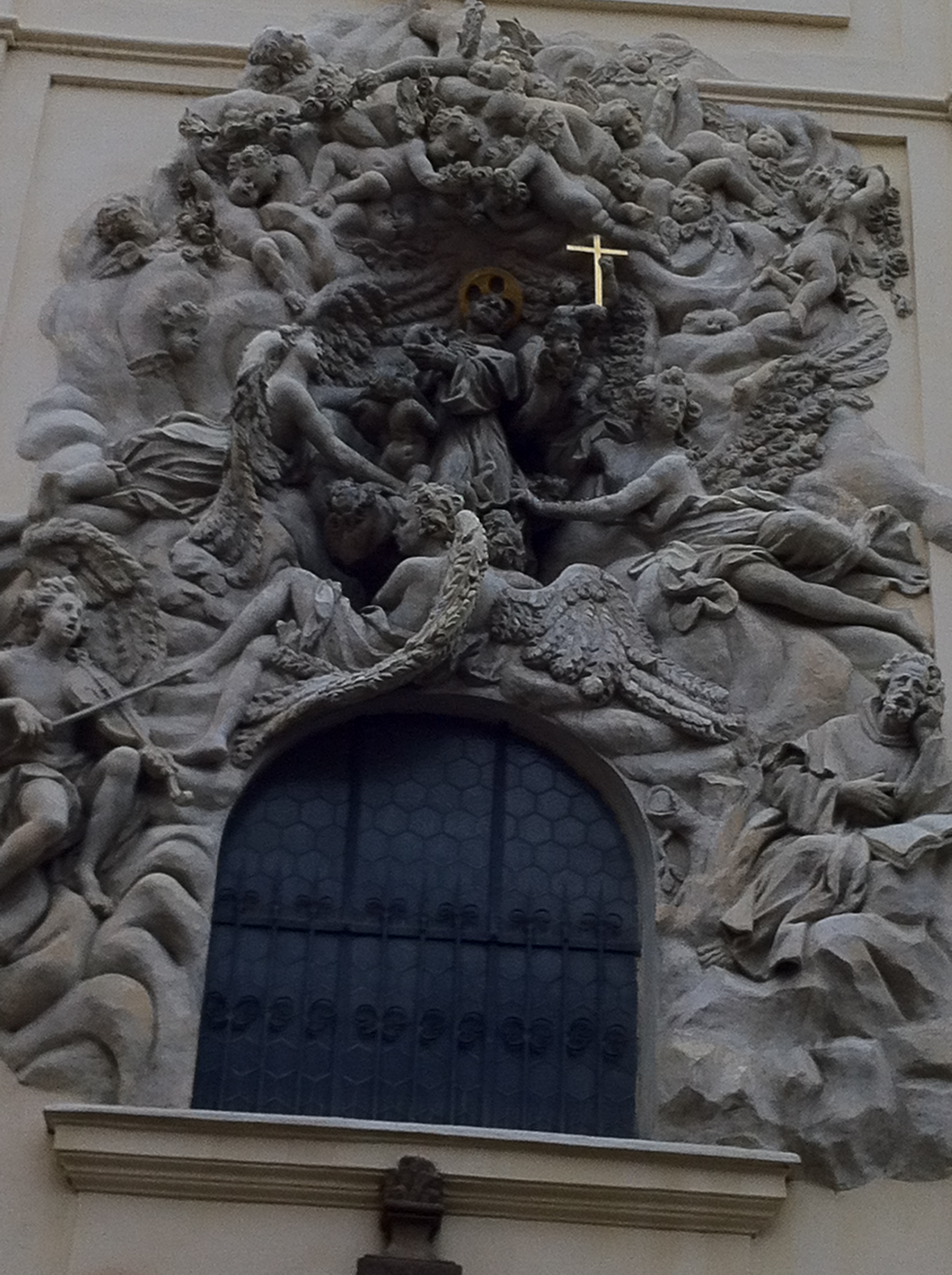 This carving is from the facade of St. Jakob's Church, the parish of the Butcher's Guild near the German merchant colony/neighborhood of the Ungelt.